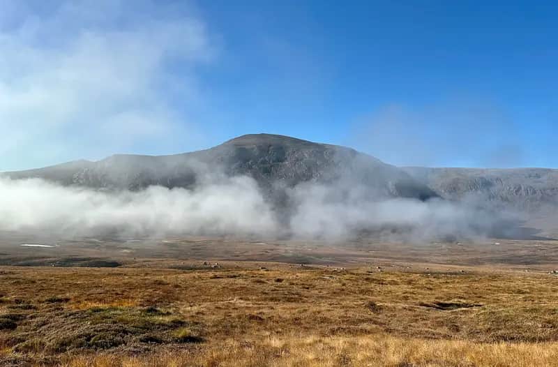 NOW YOU SEE IT ... Beinn Bhrotain makes a dramatic appearance as the early cloud sheet burns away