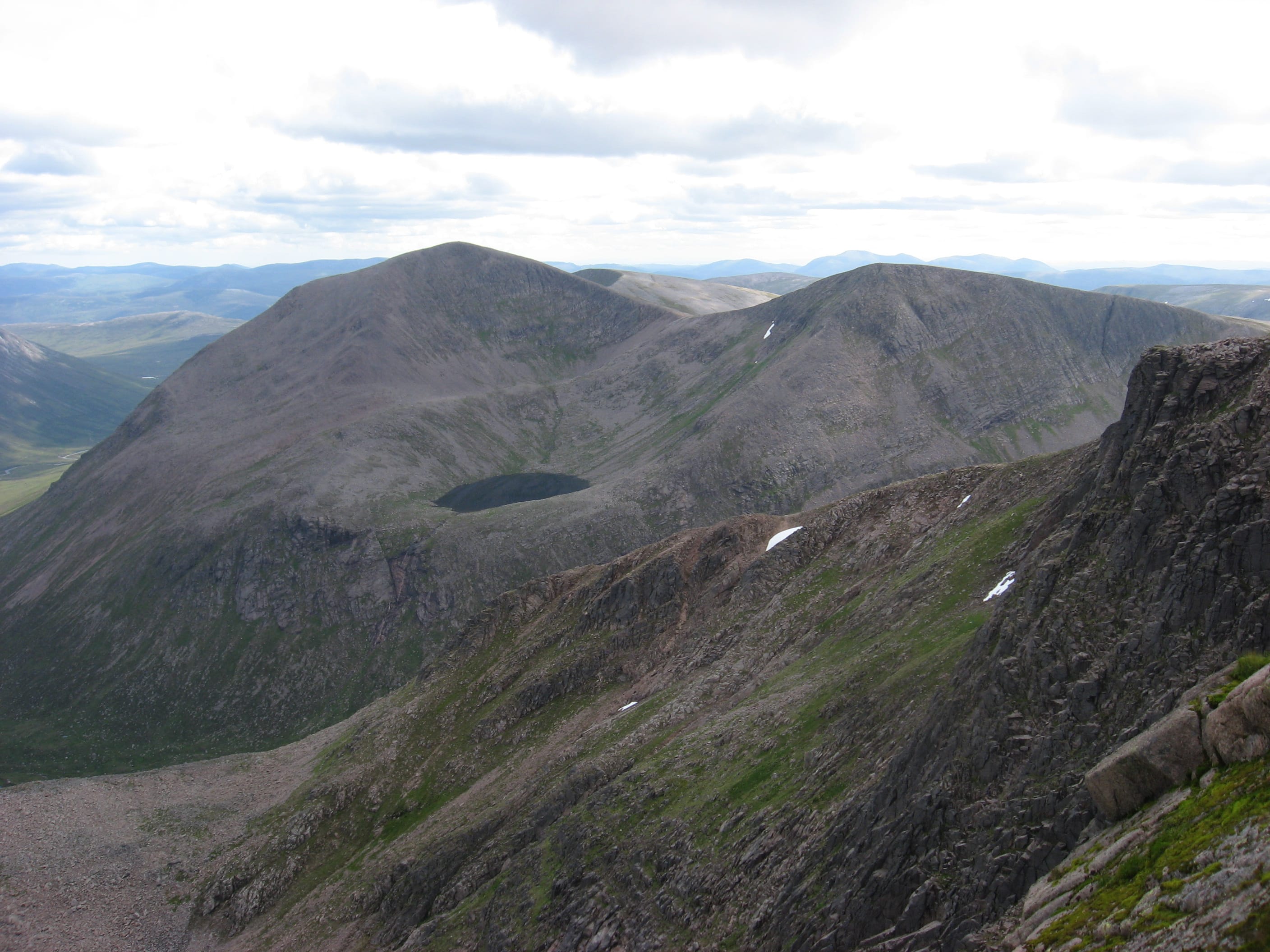 PLENTY TO TALK ABOUT: Cairn Toul and Sgor an Lochain Uaine (Angel's Peak) from the summit of Braeriach