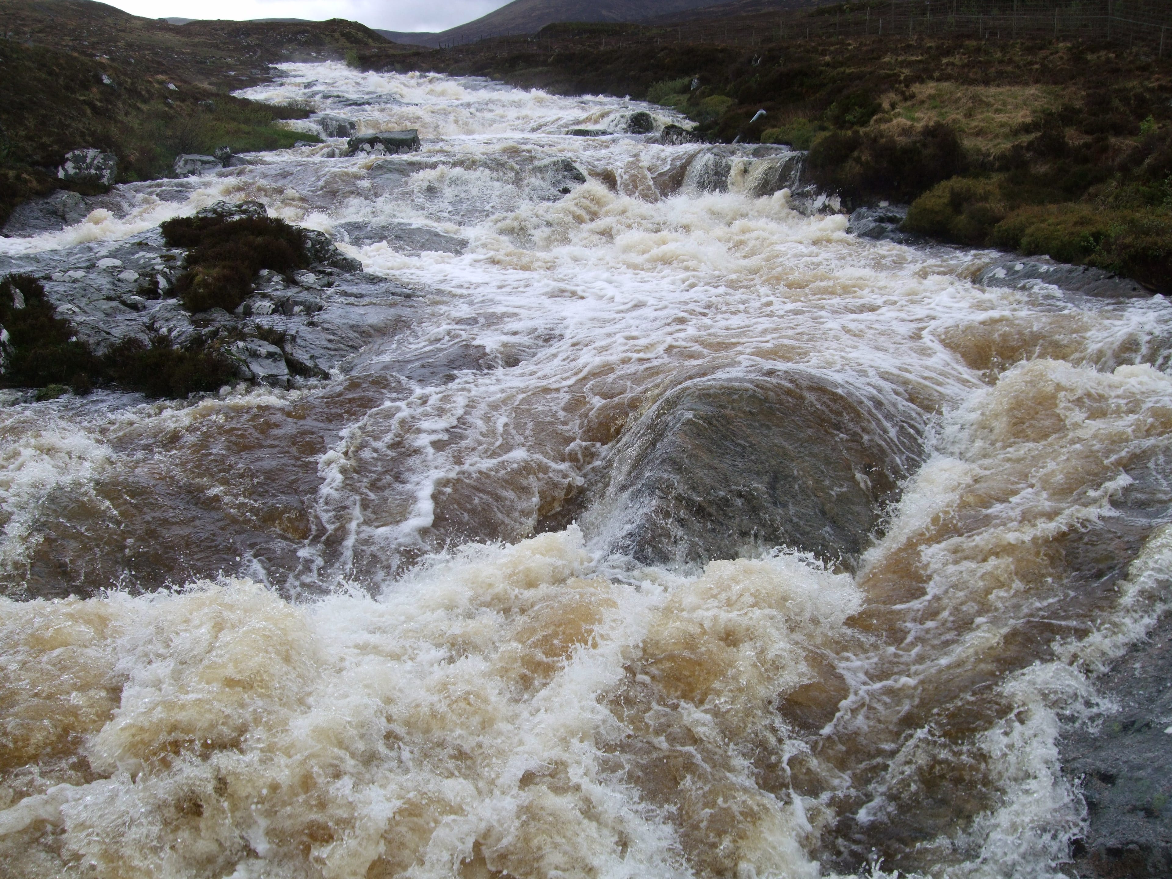 'WATER HAZARD: Raging rivers like this can prove impossible to cross during and after heavy rainfall'