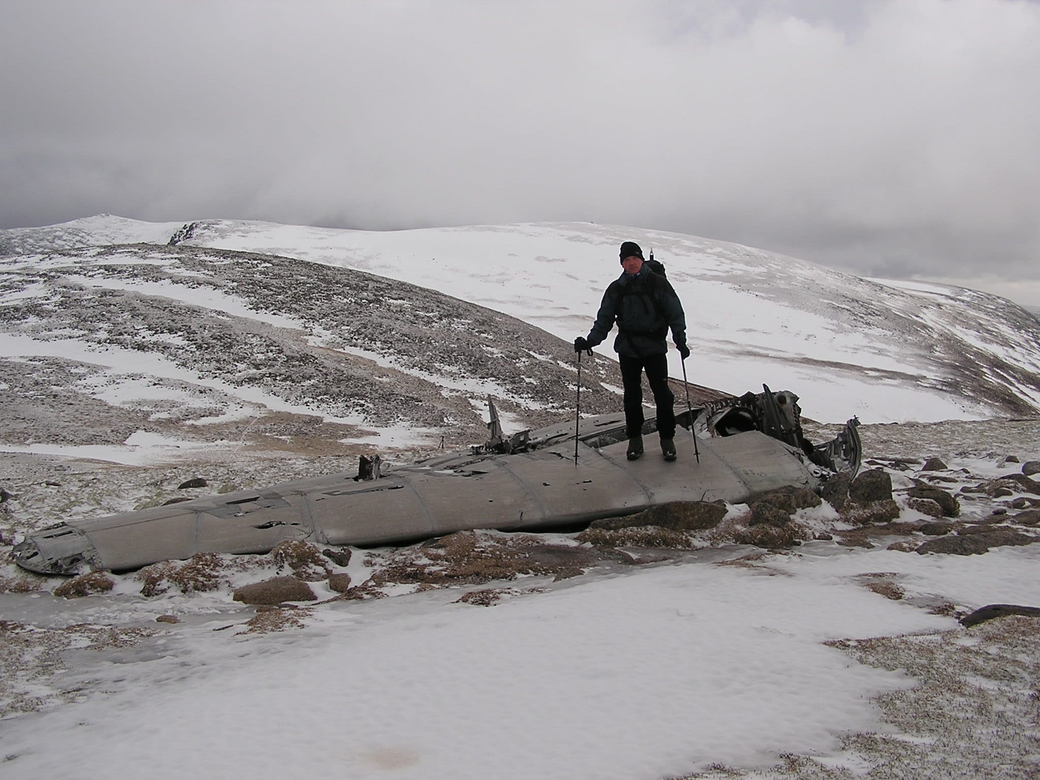 WING WALKING: On the remains of plane wreckage during a winter trip to Lochnagar a few year back