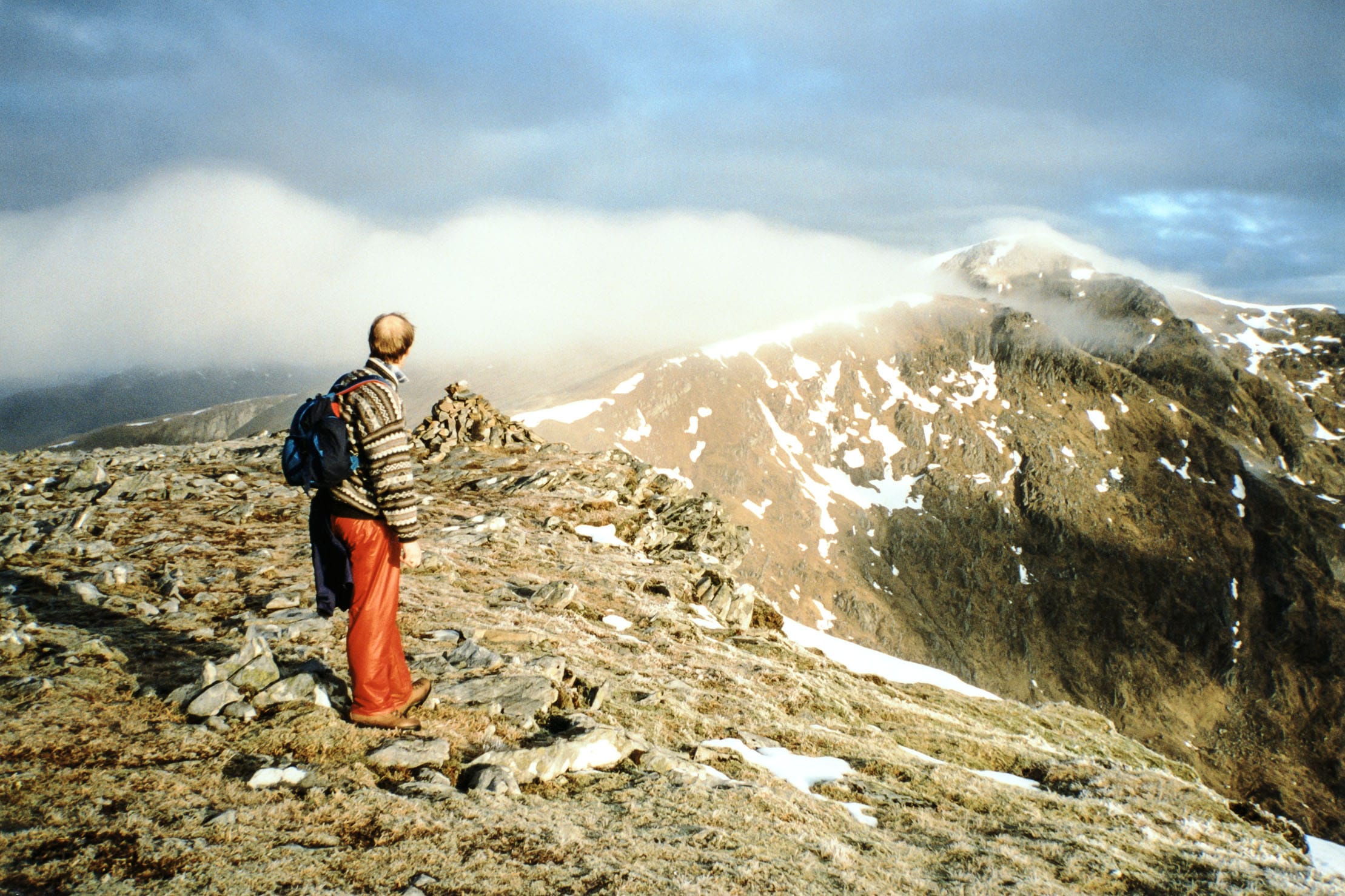 FASHION VICTIM? The early morning view to Sgurr nan Conbhairean is spoiled by a pair of red rubber trousers