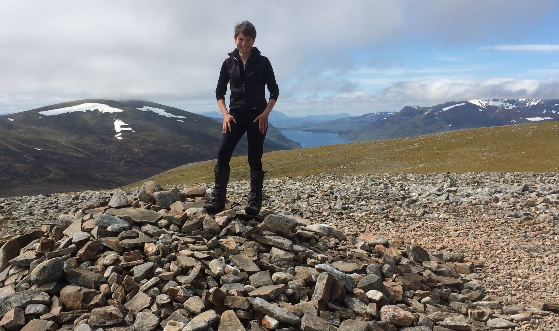 RECORD BREAKER: Hazel stands proudly on the summit cairn of Geal-charn after setting a new record for female Munro rounds