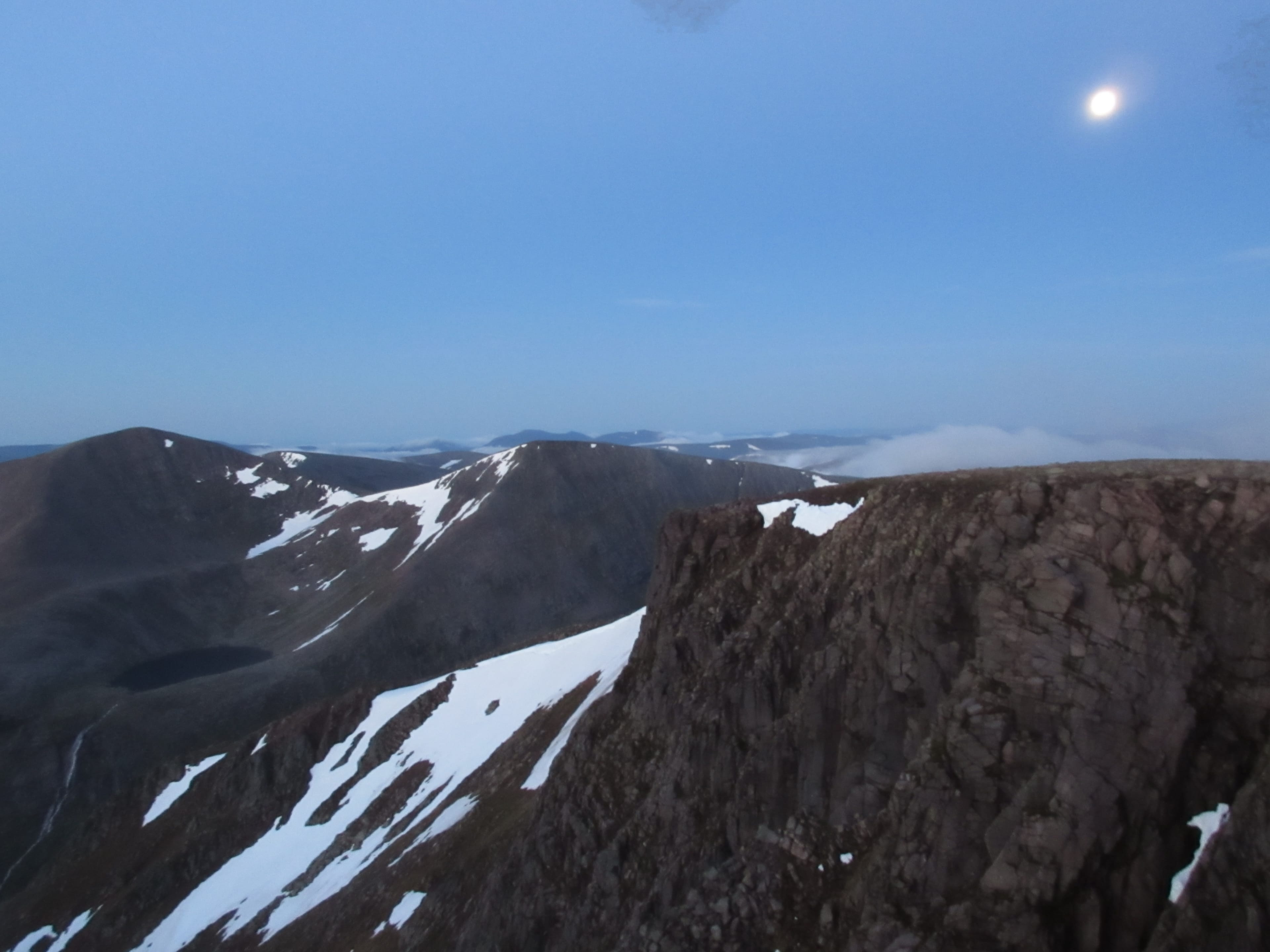 MOONSHINE: The full moon lights the way ahead over Braeriach, Sgor an Lochain Uaine and Cairn Toul at 3am