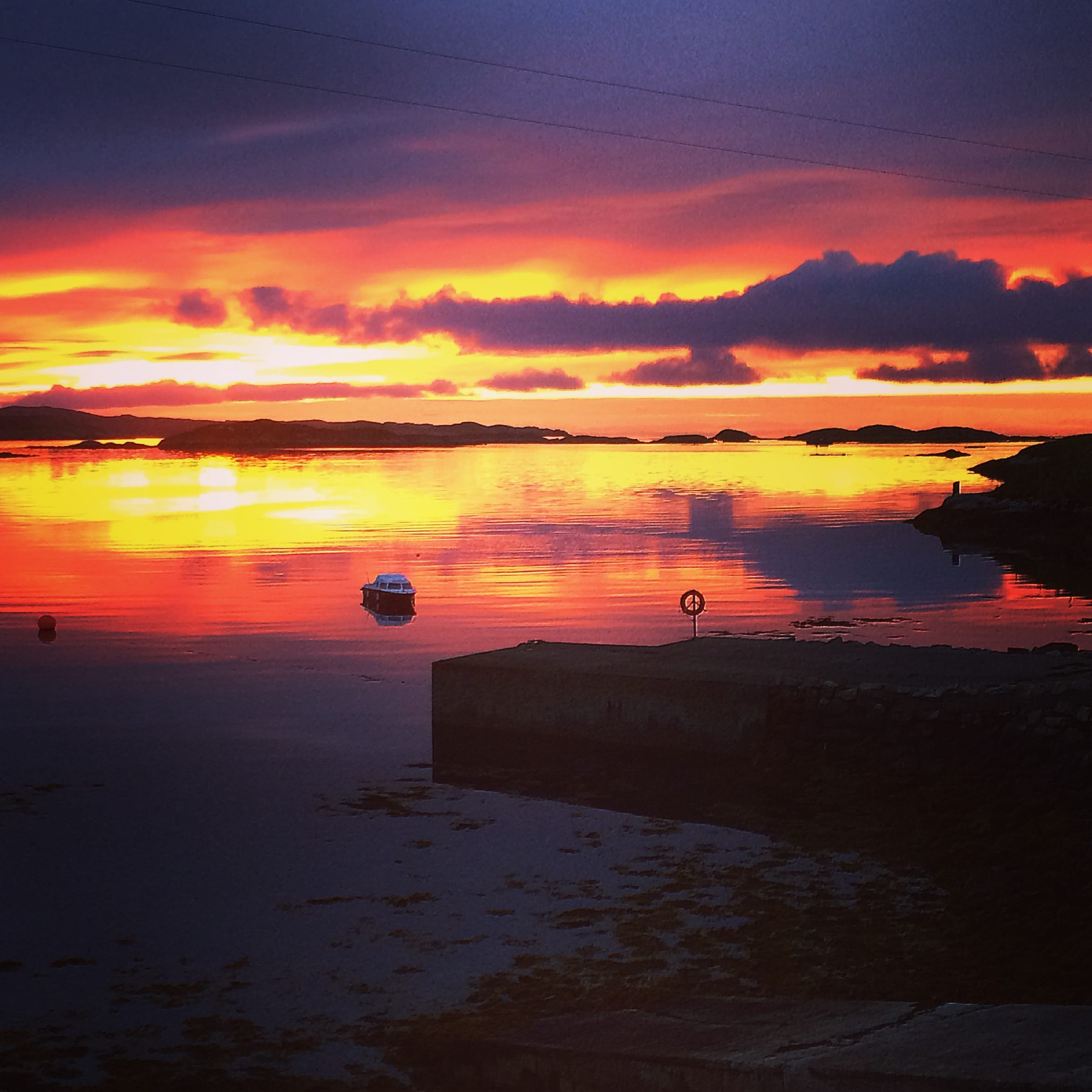 STUNRISE: The horizon is bathed in the full spectrum of colour as the sun rises on the east coast of Harris