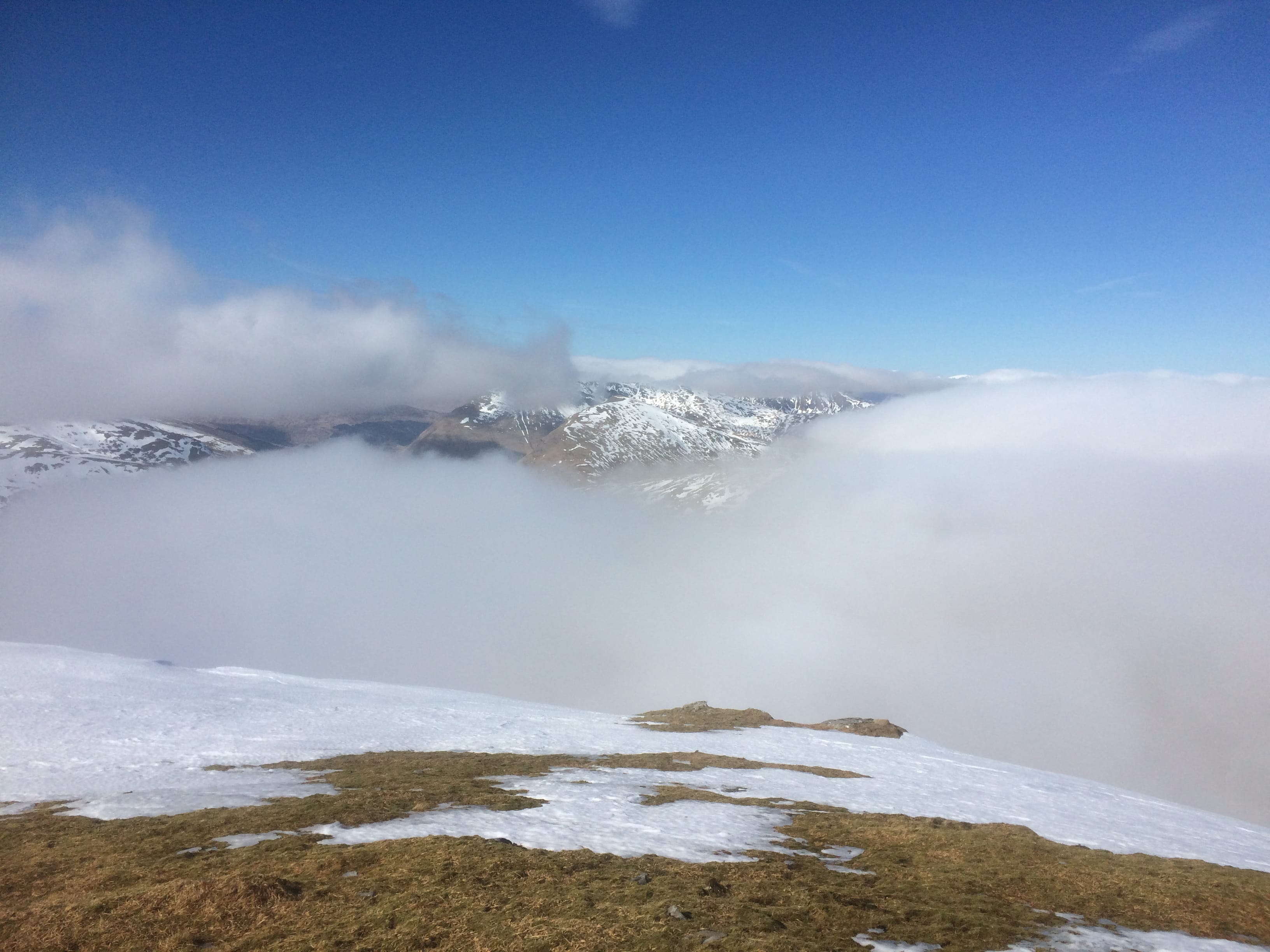 PEEK PRACTICE: The Mamlorn peaks can be seen pushing their way up through the clouds from summit of Ben Challum