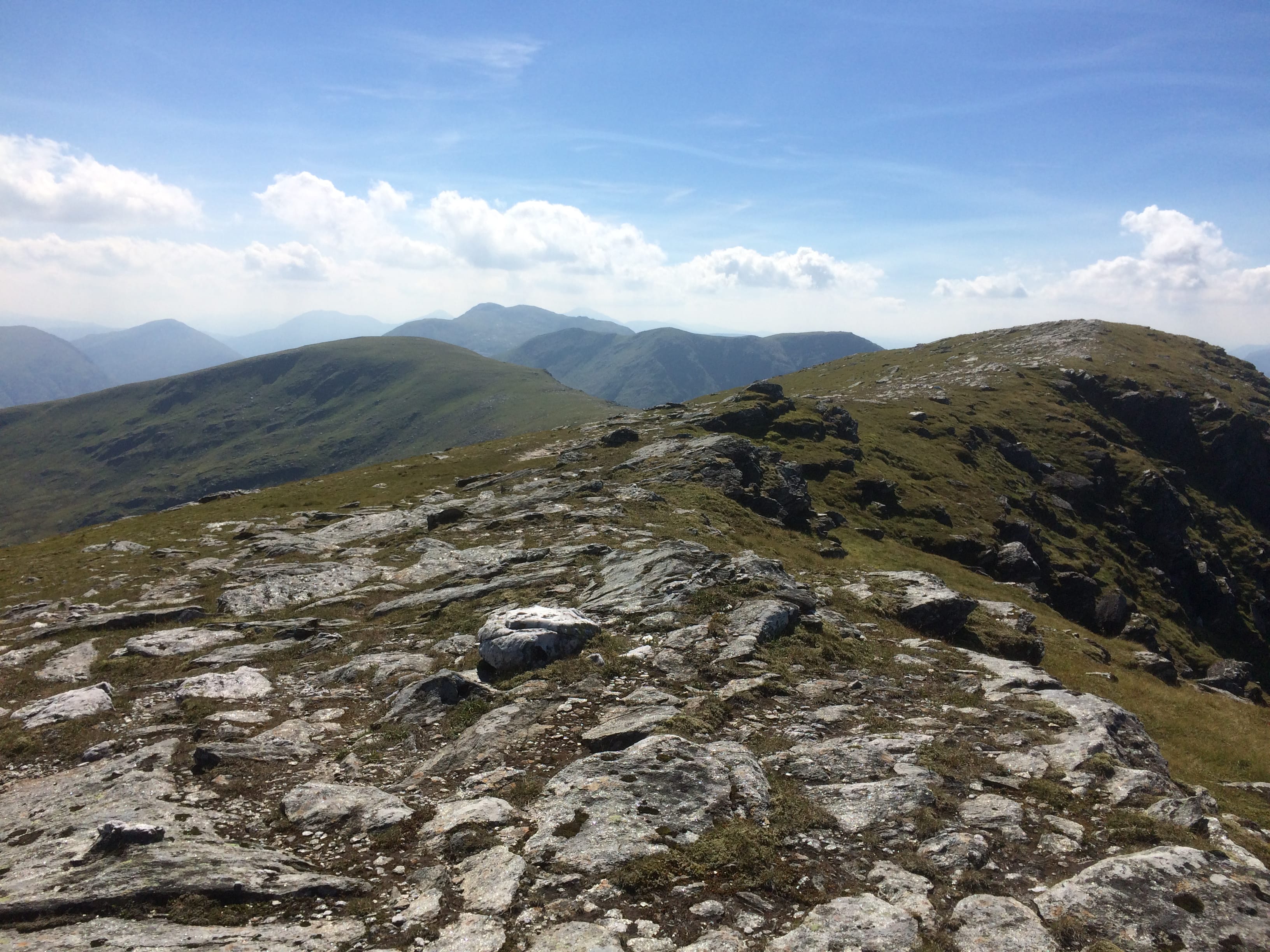 'NEXT IN LINE: Beinn Dorain and Beinn an Dothaidh on the horizon from Beinn Achaladair on a traverse of the Bridge of Orchy Munros'