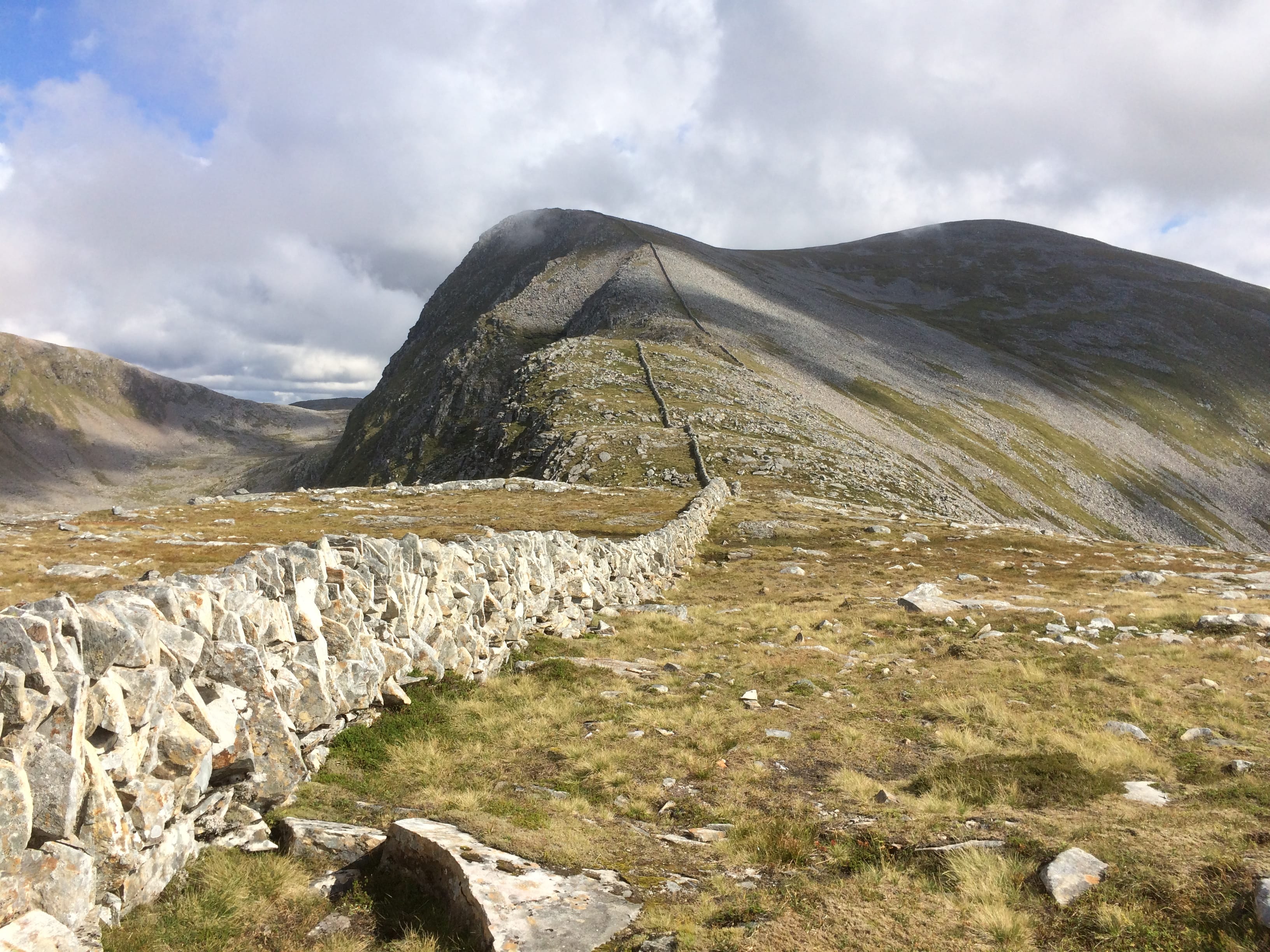'THE GREAT WALL: Looking back along the massive drystone wall towards the summit of Beinn Dearg, a sad reminder of the past'