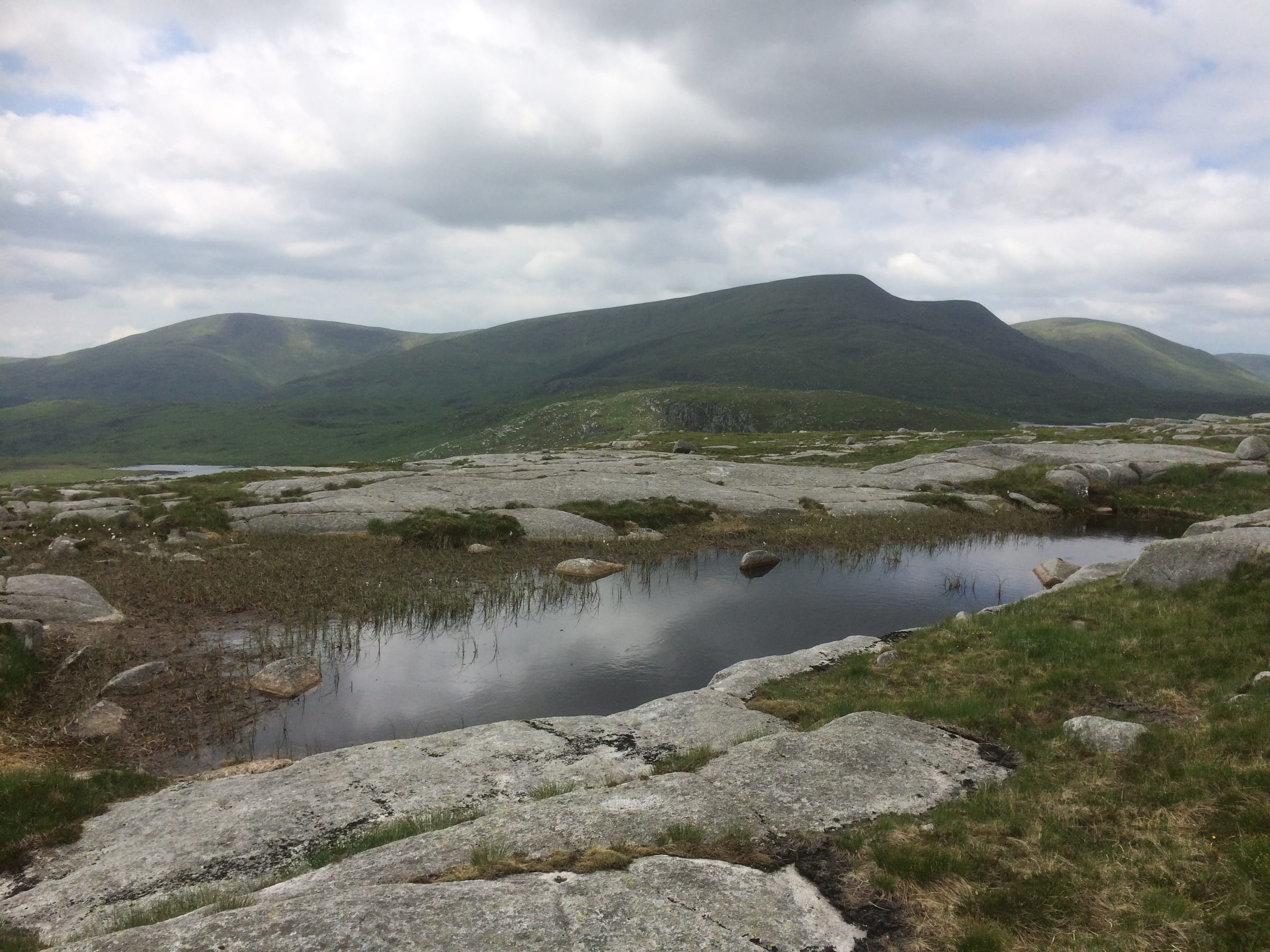 SOUTHERN HIGH: Looking back over to The Merrick from the ascent over the rocky plates of Craignaw