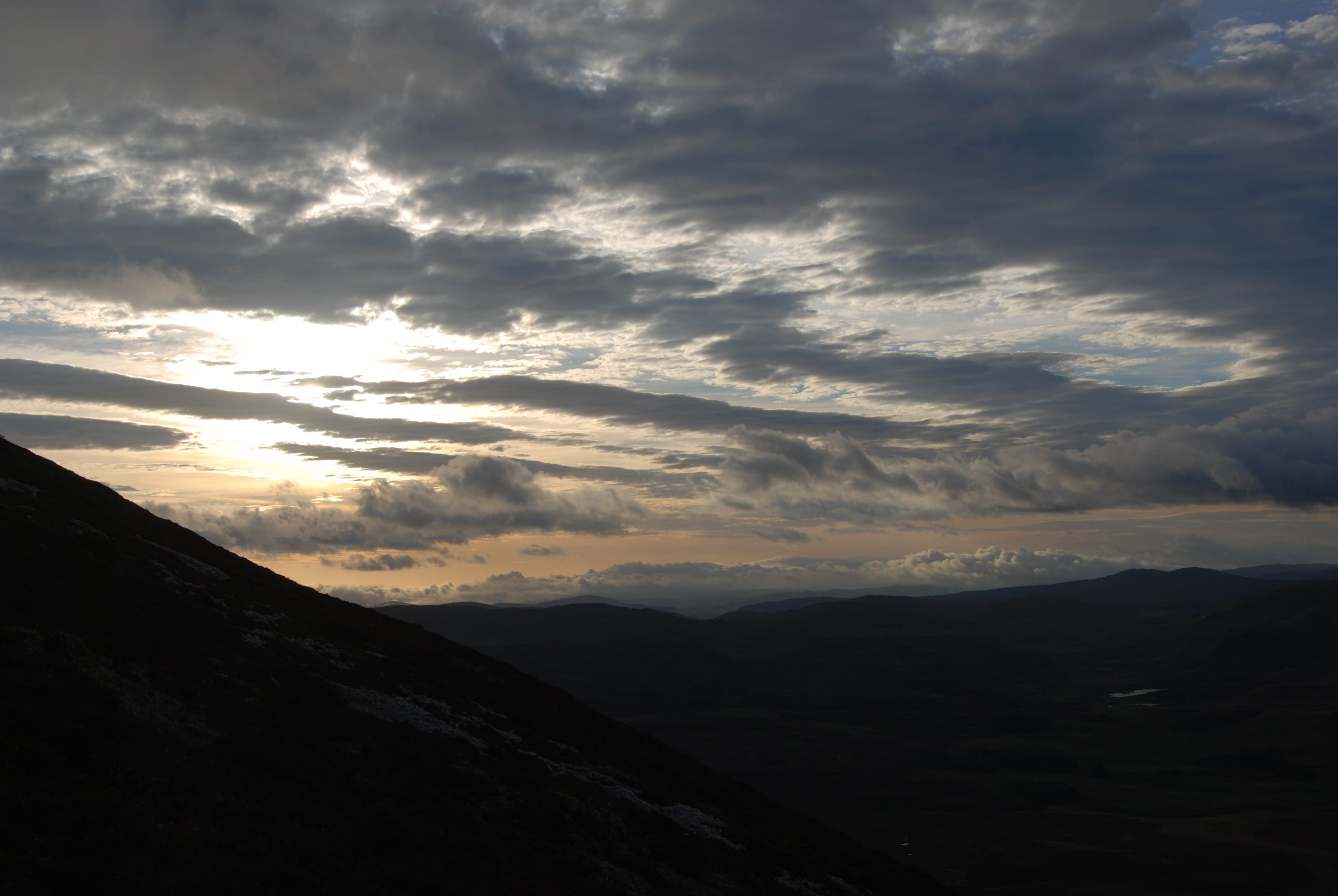 'MORNING CALM: Streaked skies from Being a'' Ghlo after a night spent in the mist on this triple Munro mountain'