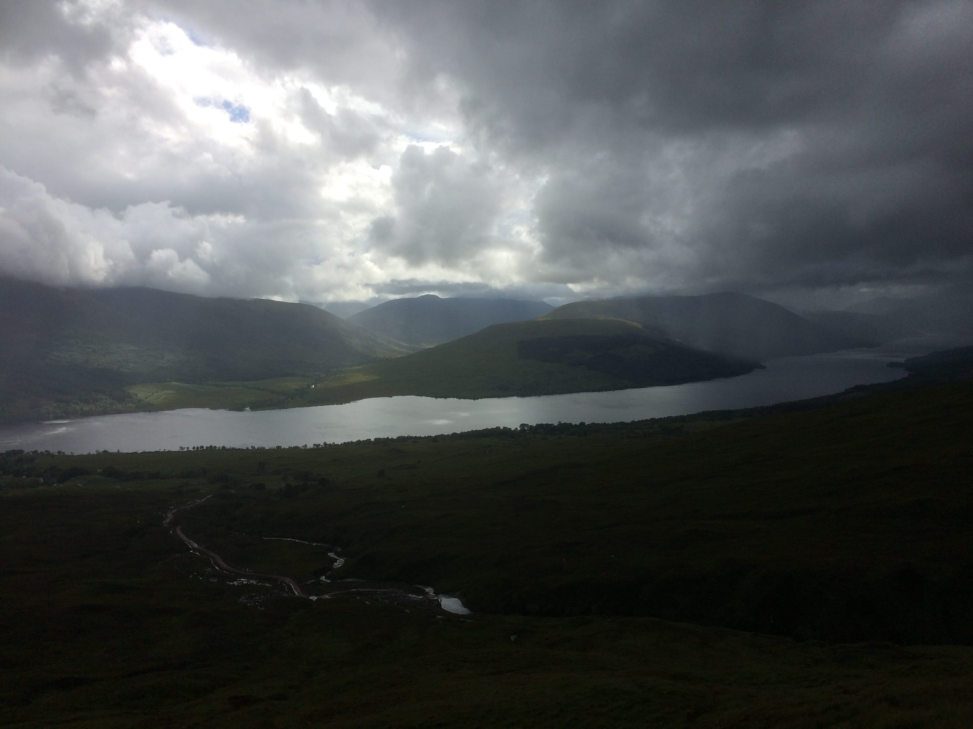 RAINY SEASON: Dark skies over Loch Arkaig - the landscape can look spectacular but raging rivers can be big danger