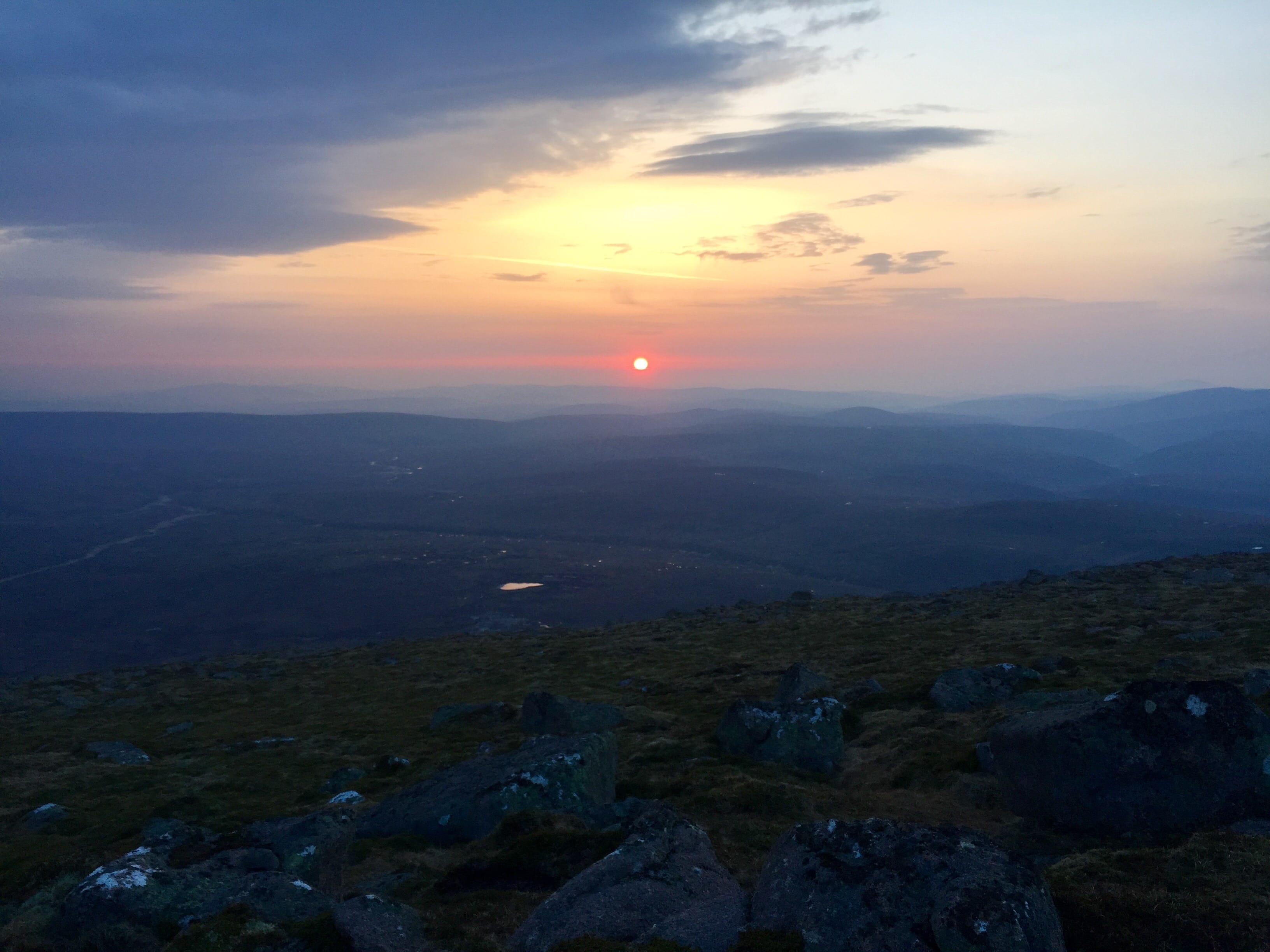 'NEW DAWN: Watching the sunrise from the summit of Bynack More after a night traverse over Creag Mhor'
