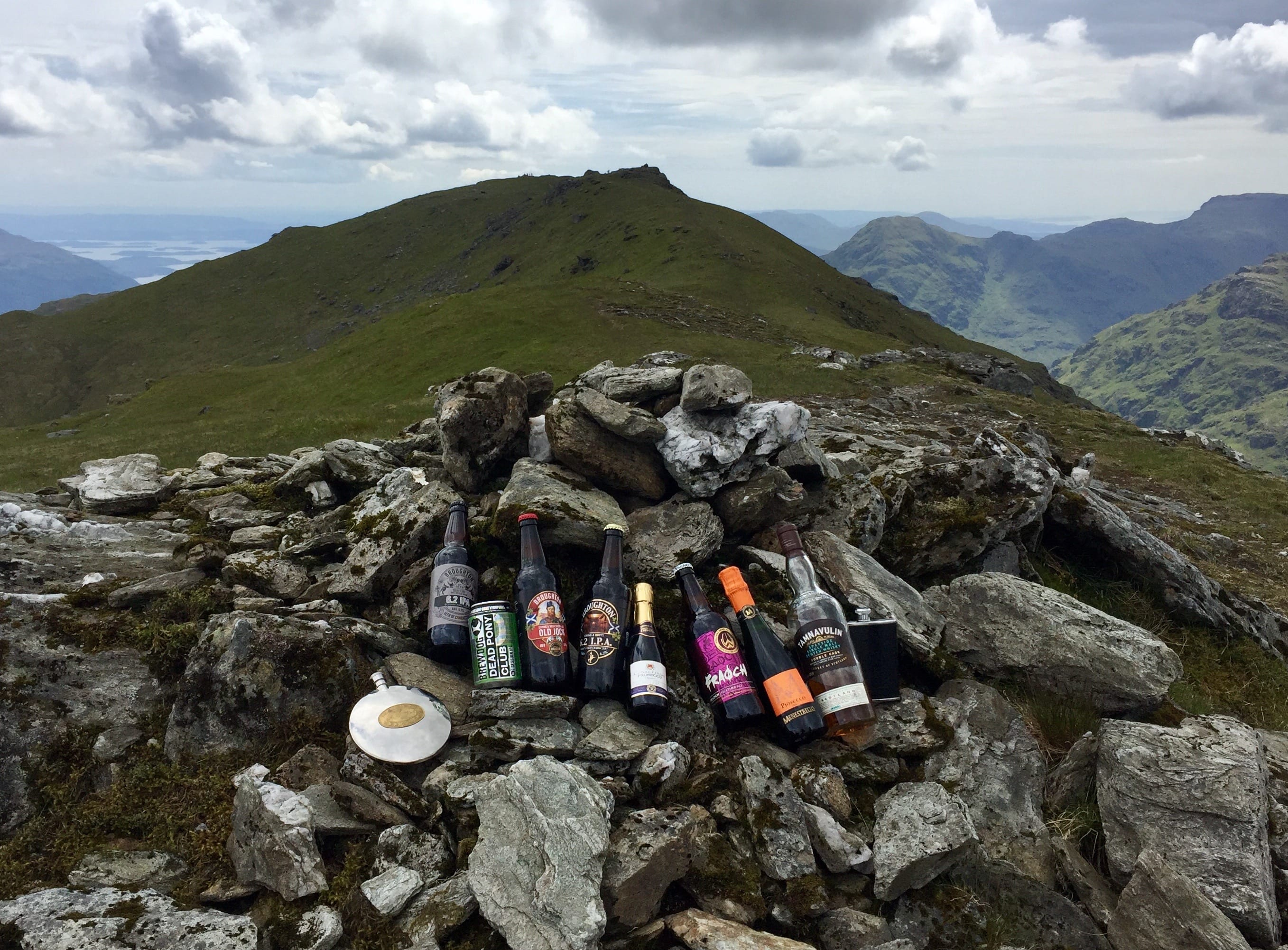 SUMMIT TRIBUTE: The toast is all laid out of the North Top of Ben Vorlich with the main summit in the background