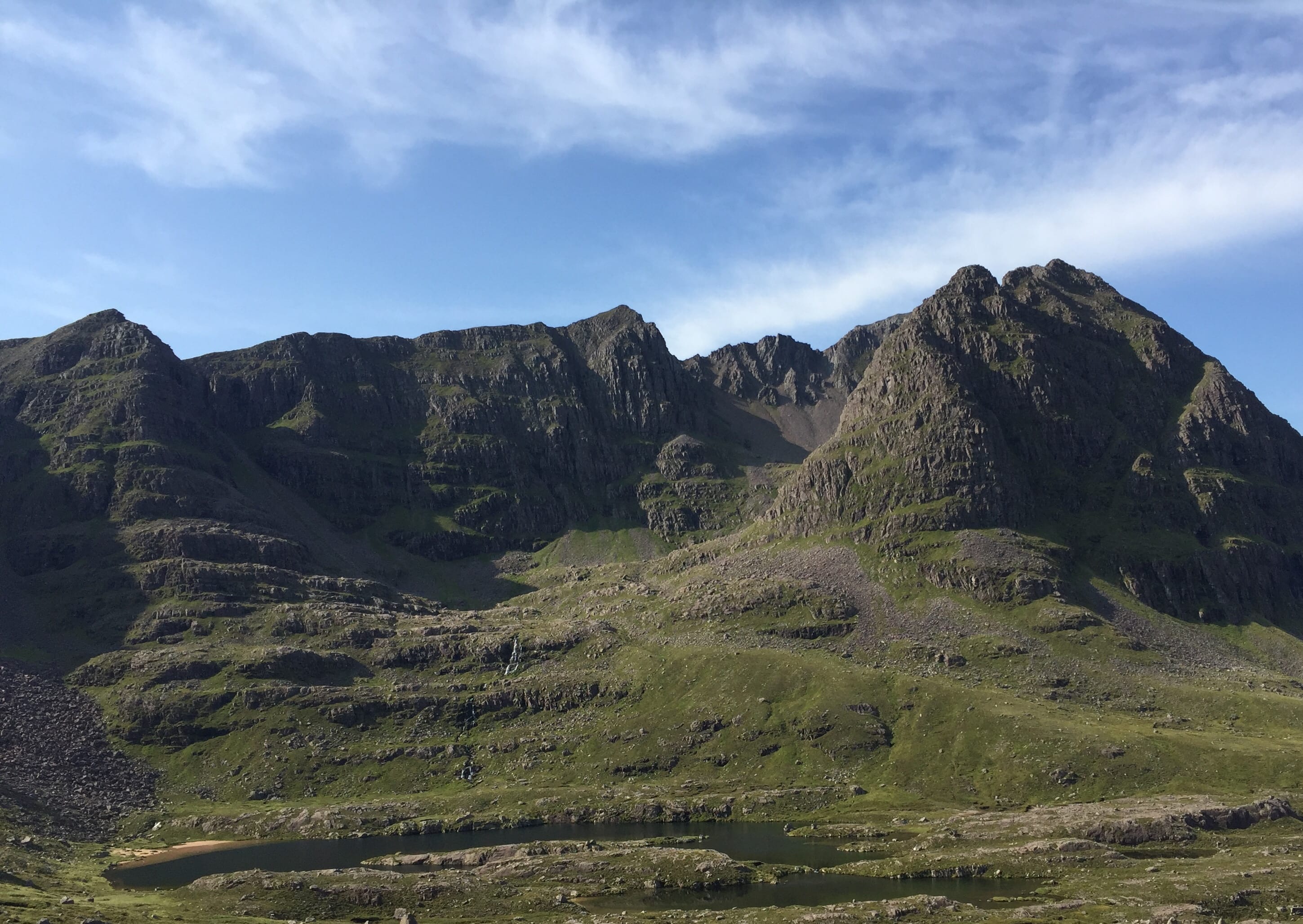 HARD TARGET: Lying off the main ridge Meall Dearg (right) on Liathach is reckoned to be one of harder Munro Tops to reach