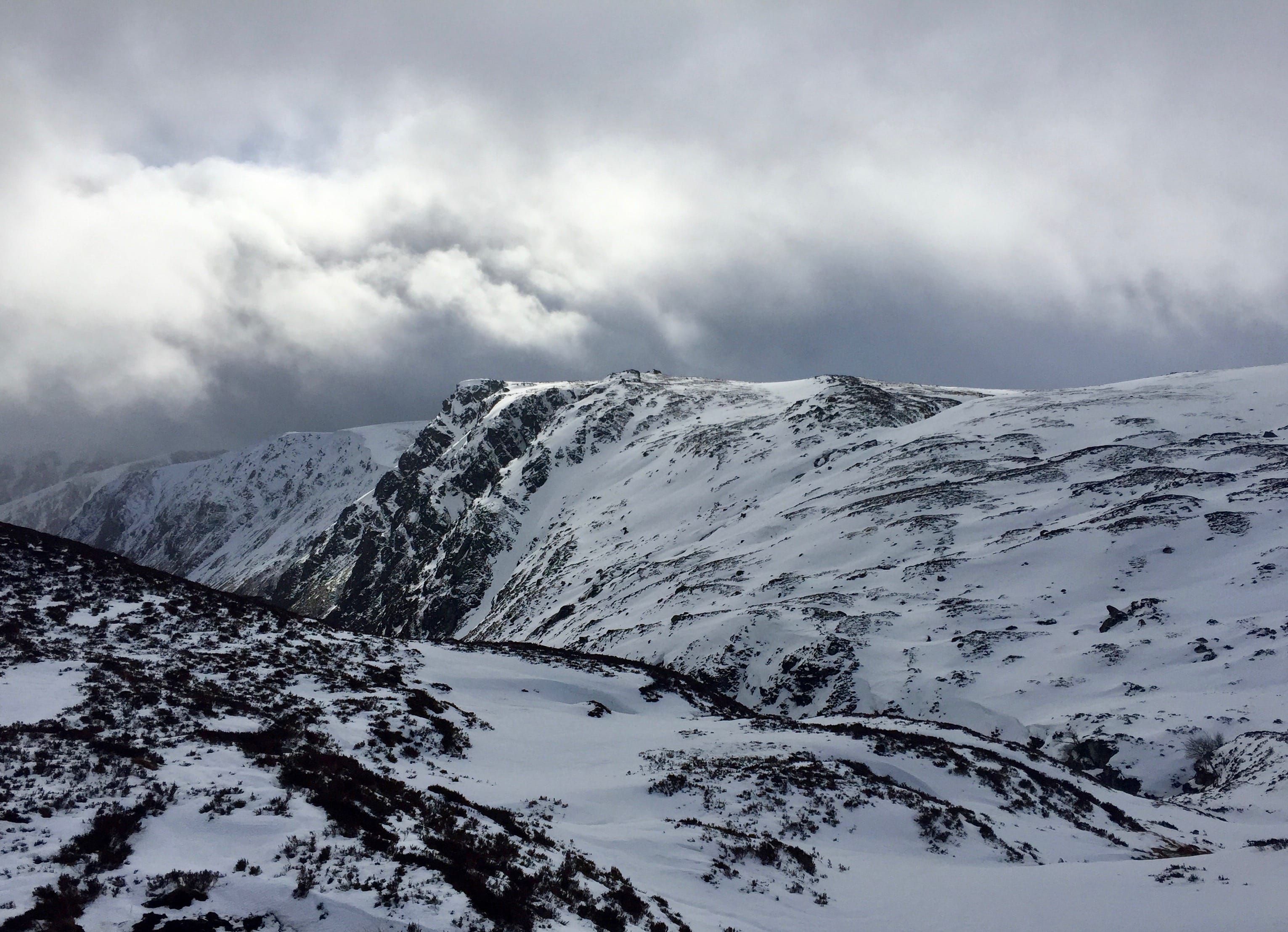 HIGH POINT: Snowy faces and threatening skies near the shelter on Jock's Road, a route that has seen its share of tragedy