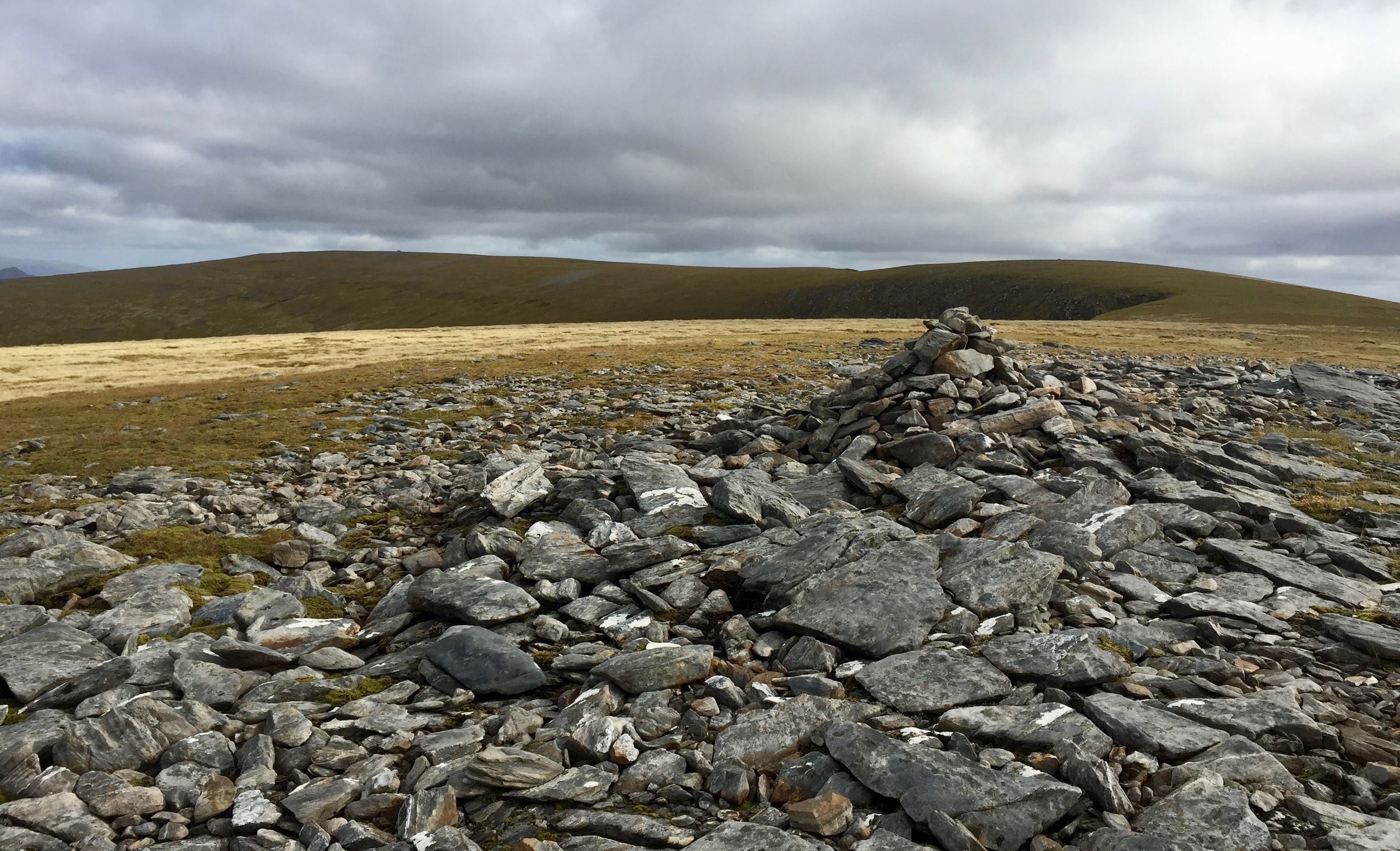 DISTANT RIVALS: Maoile Lunndaidh, left, and Creag Toll a' Choin, right, on the horizon, seen from Carn nam Fiaclan