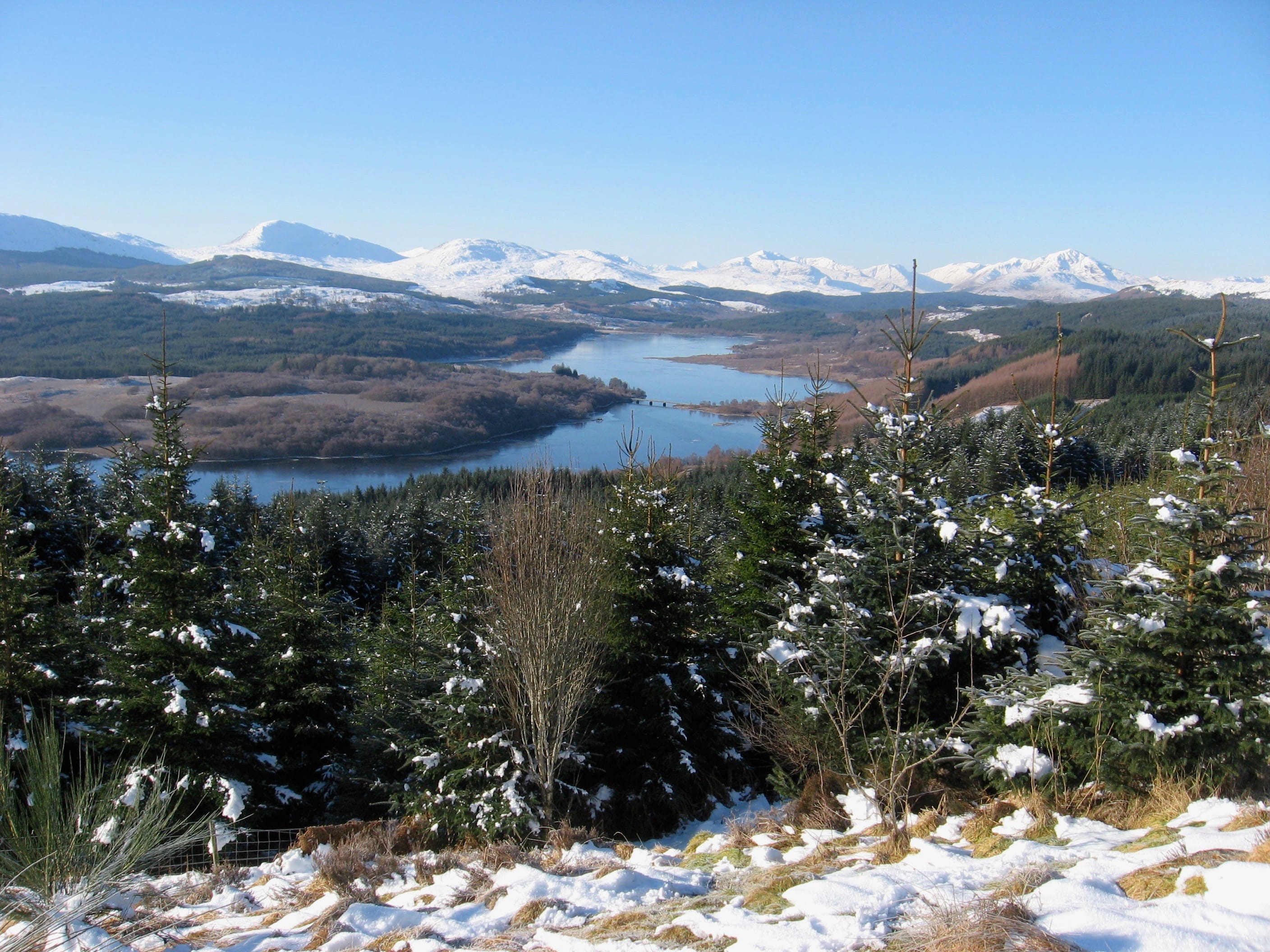 BLUE AND WHITE PERFECTION: A sunny winter day looking over Loch Garry to the distant snowy peaks of Glen Shiel