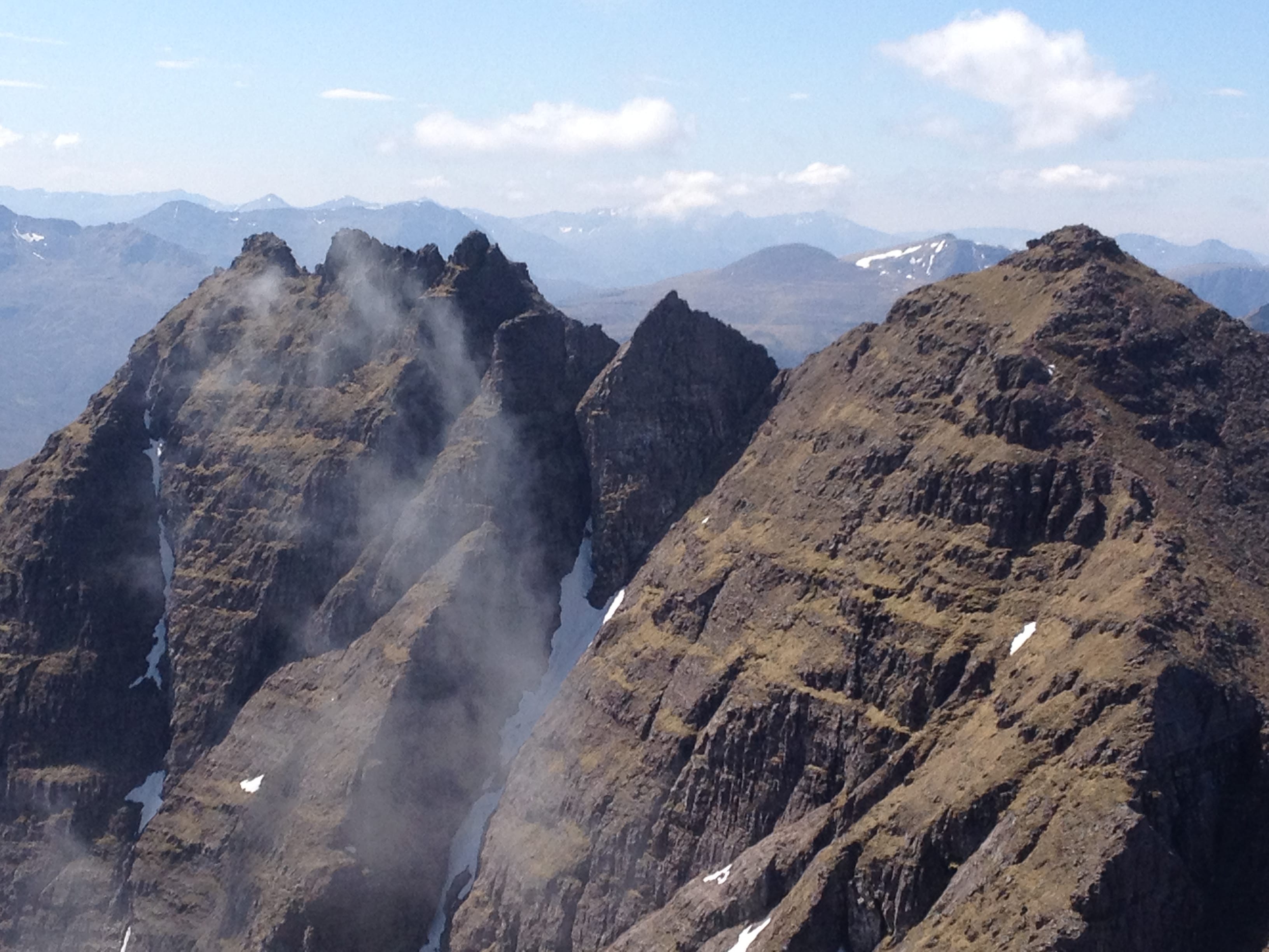 'BEST SEAT IN THE HOUSE: The serrated skyline of An Teallach with Lord Berkeley''s Seat, centre, prominent'