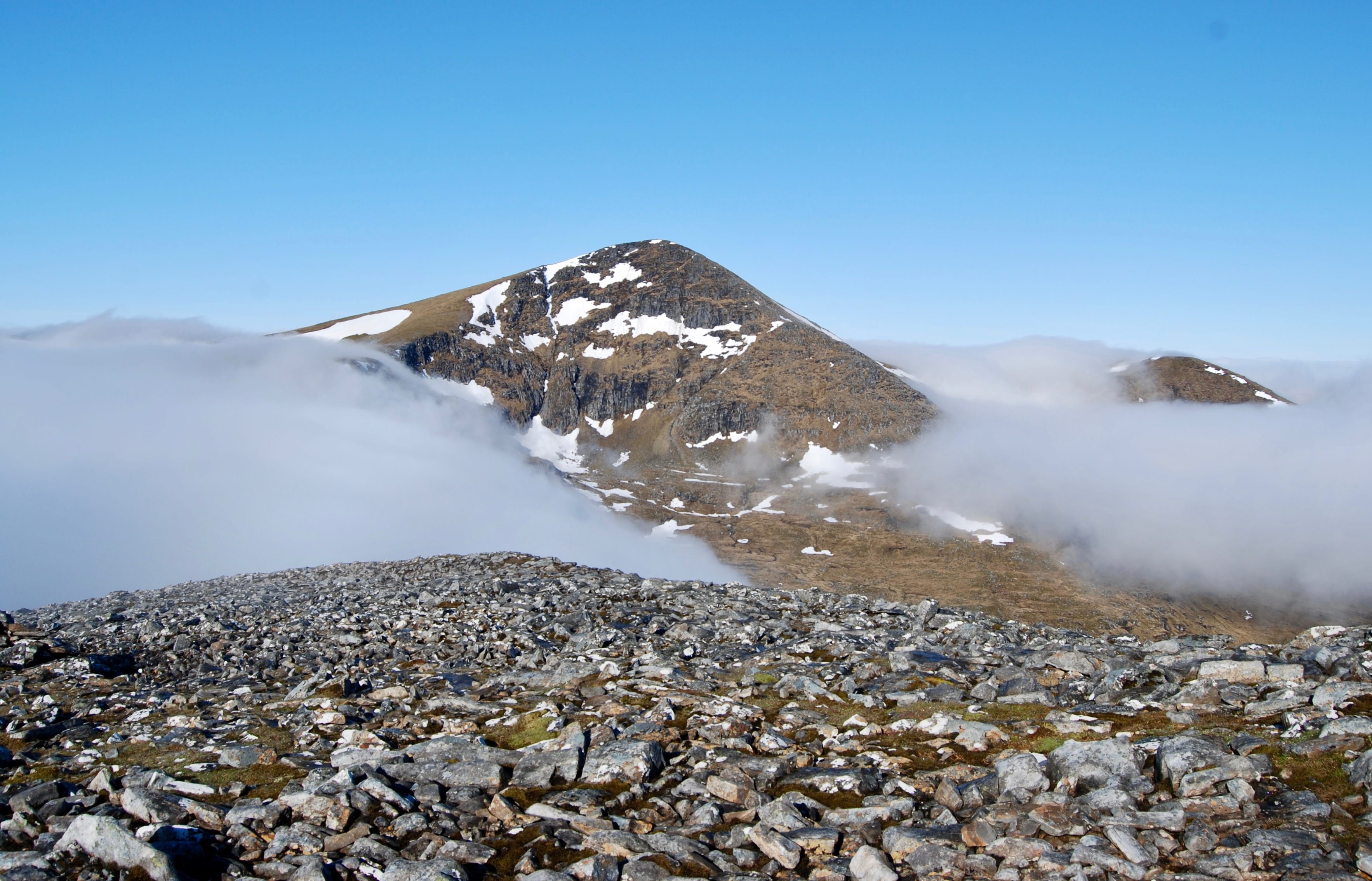 WOW MOMENT: Sgurr Mor appears above the rolling sea of cloud in the view from Beinn Liath Mhor Fannaich