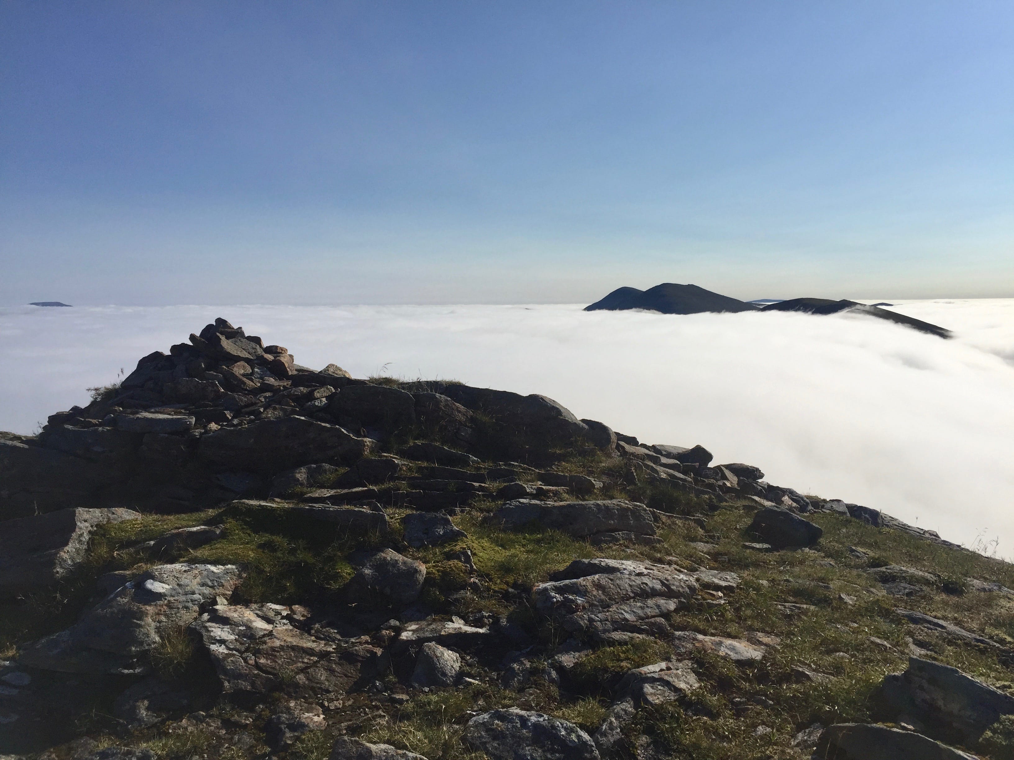 ISLANDS IN THE STREAM: Looking from summit of A'Chailleach over ocean of cloud to Sgurr Breac and Sgurr nan Clach Geala
