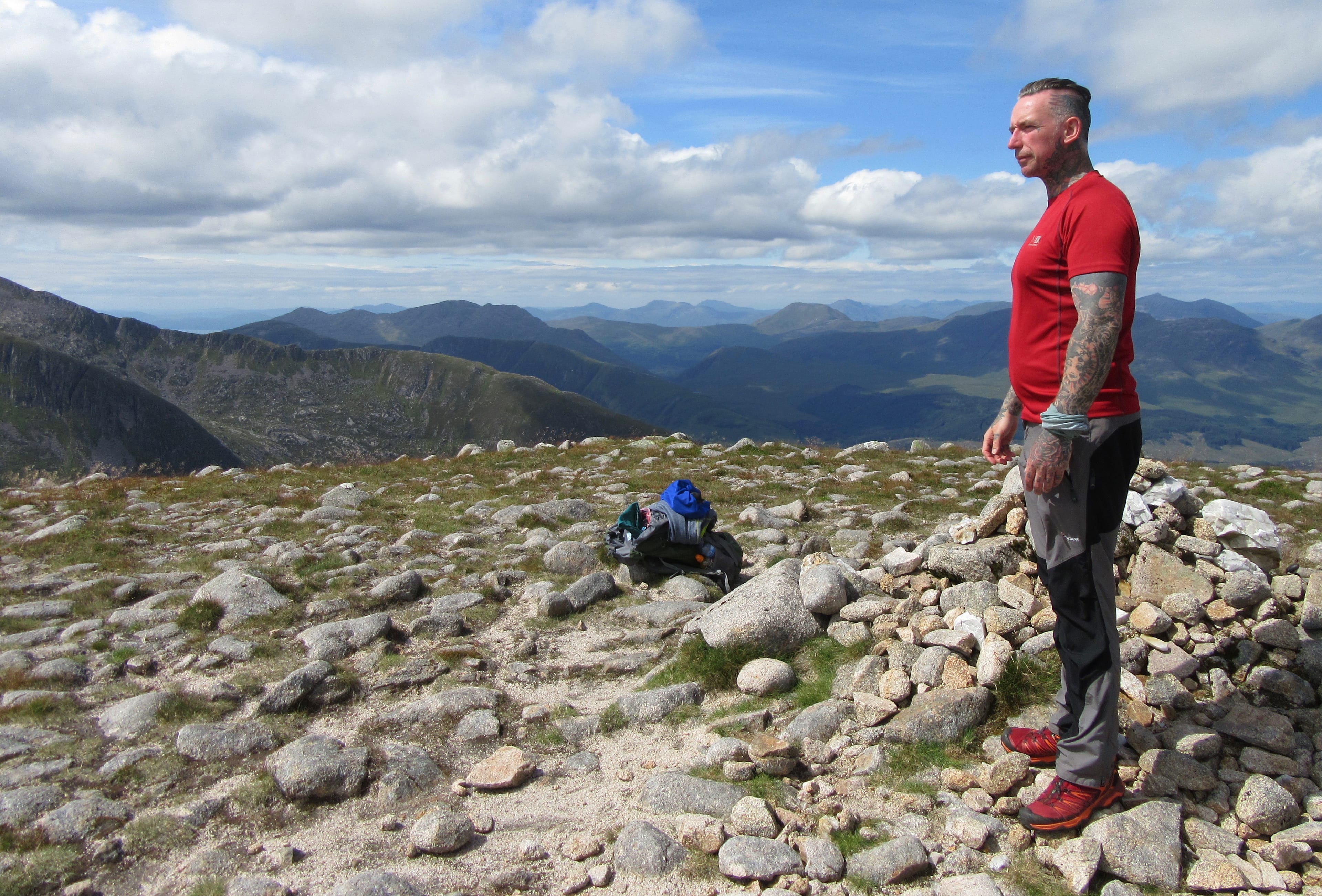 MOUNTAIN MAN: Steve in his element – taking in the view from the summit of a hill (Picture courtesy of Colin Leeming)