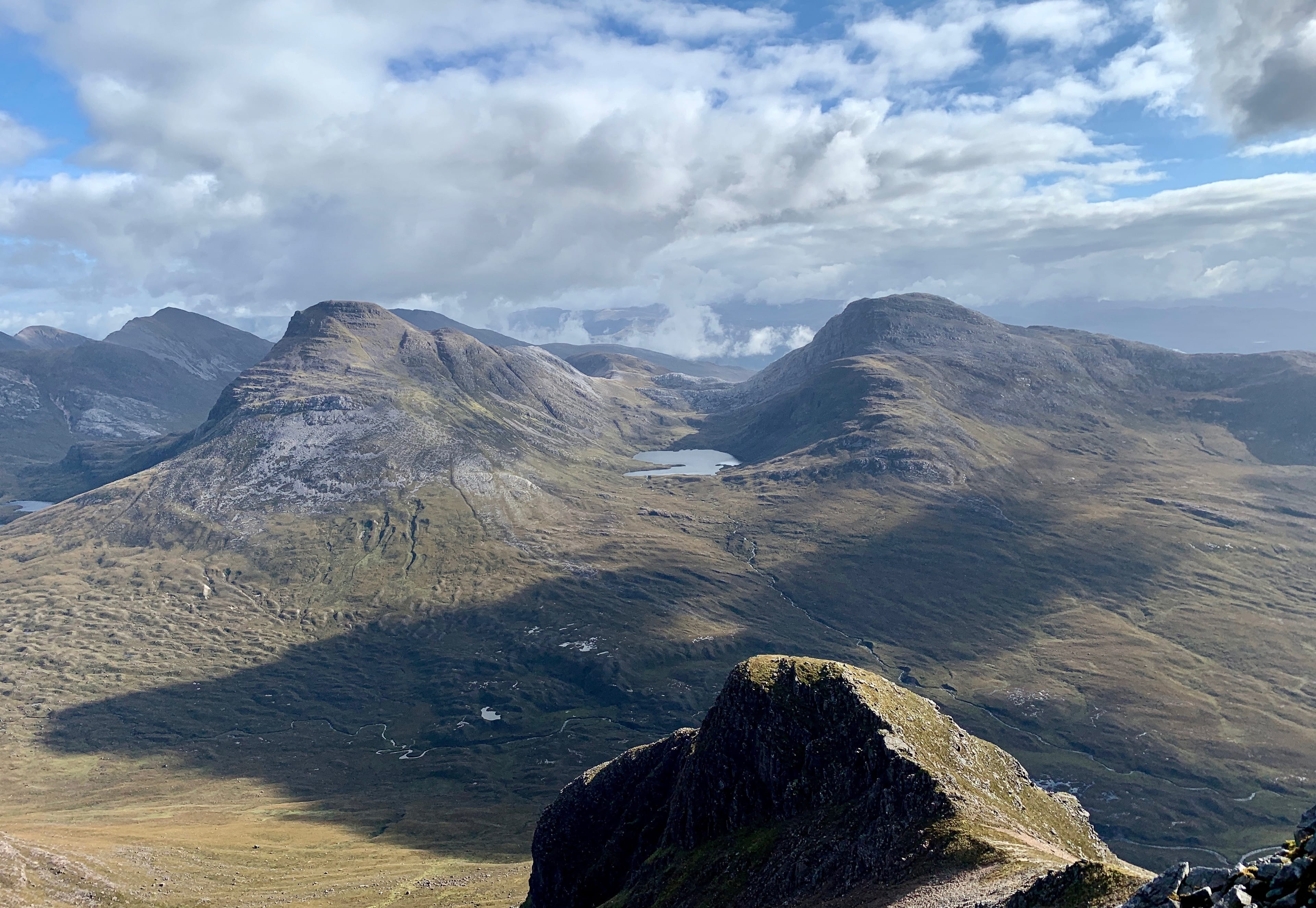 TWIN PEAKS: The Coulin duo of Maol Chean-deag and An Ruadh-stac from the summit of Beinn Damh