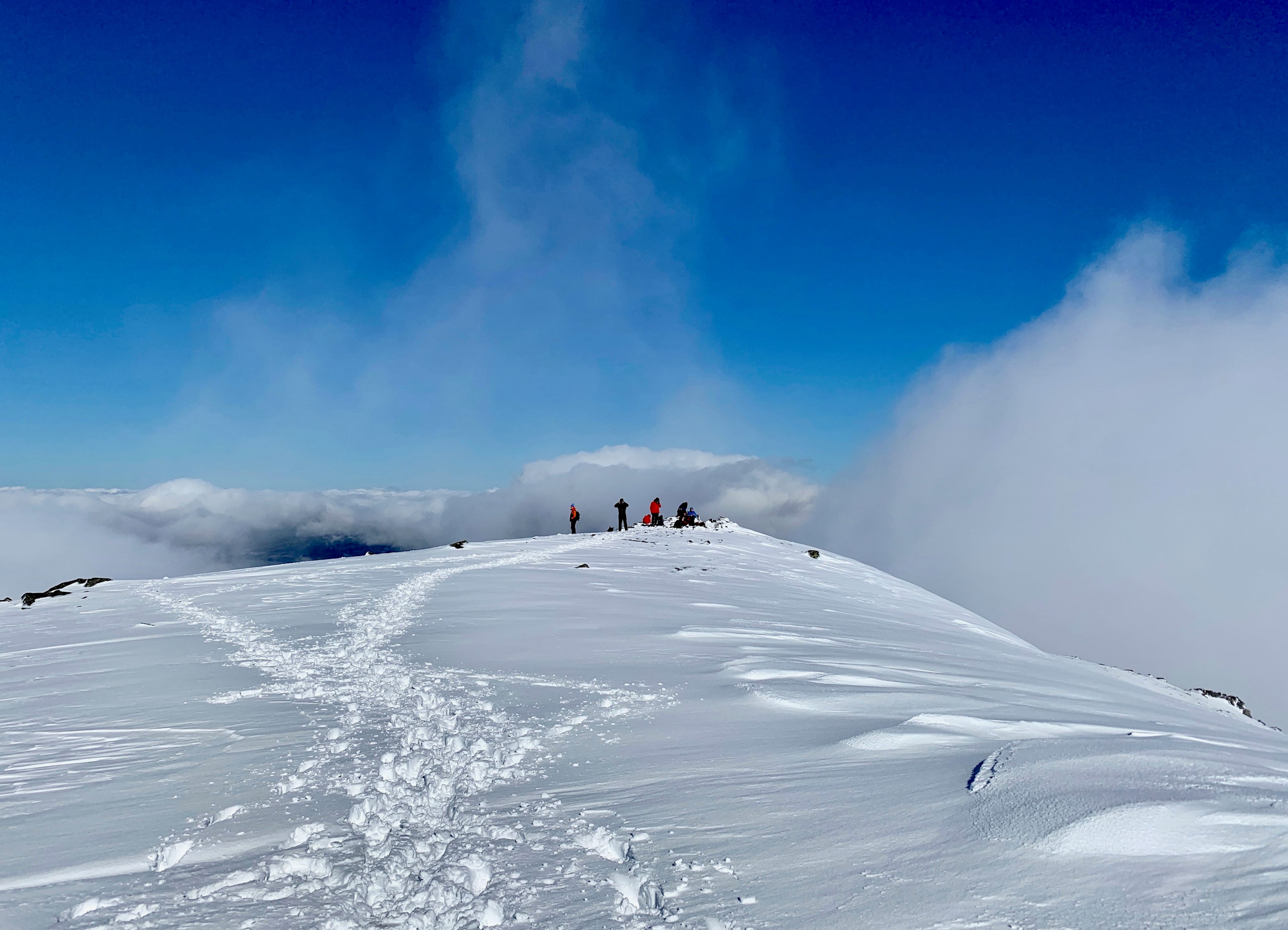 CLEAR WINNER: Blue sky and towering cloud above the summit of Carn Gorm as the early blows away 