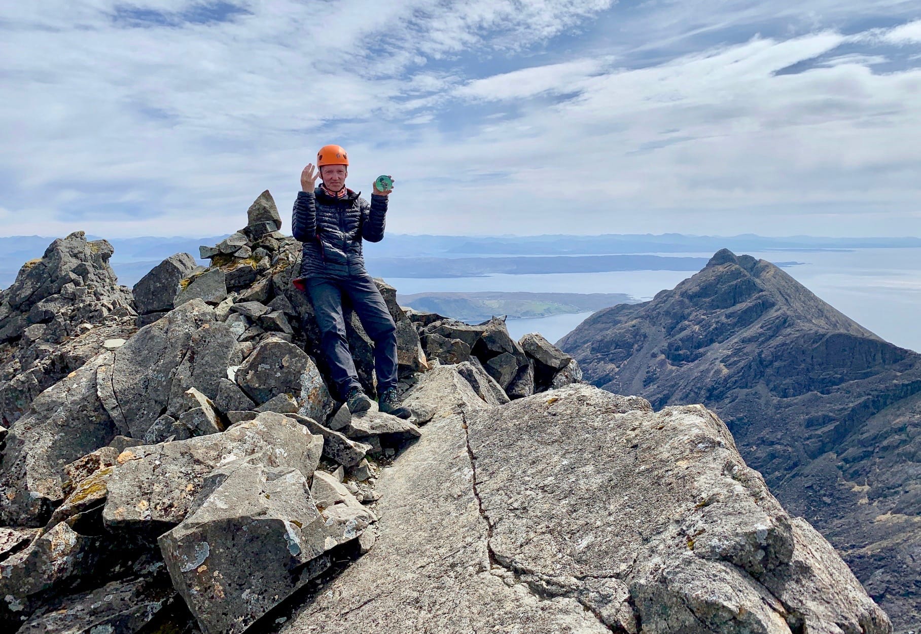 FOURTH OF NATURE: Celebrating the latest Munros finish on the airy summit of Sgurr Dubh Mor on a perfect Skye day