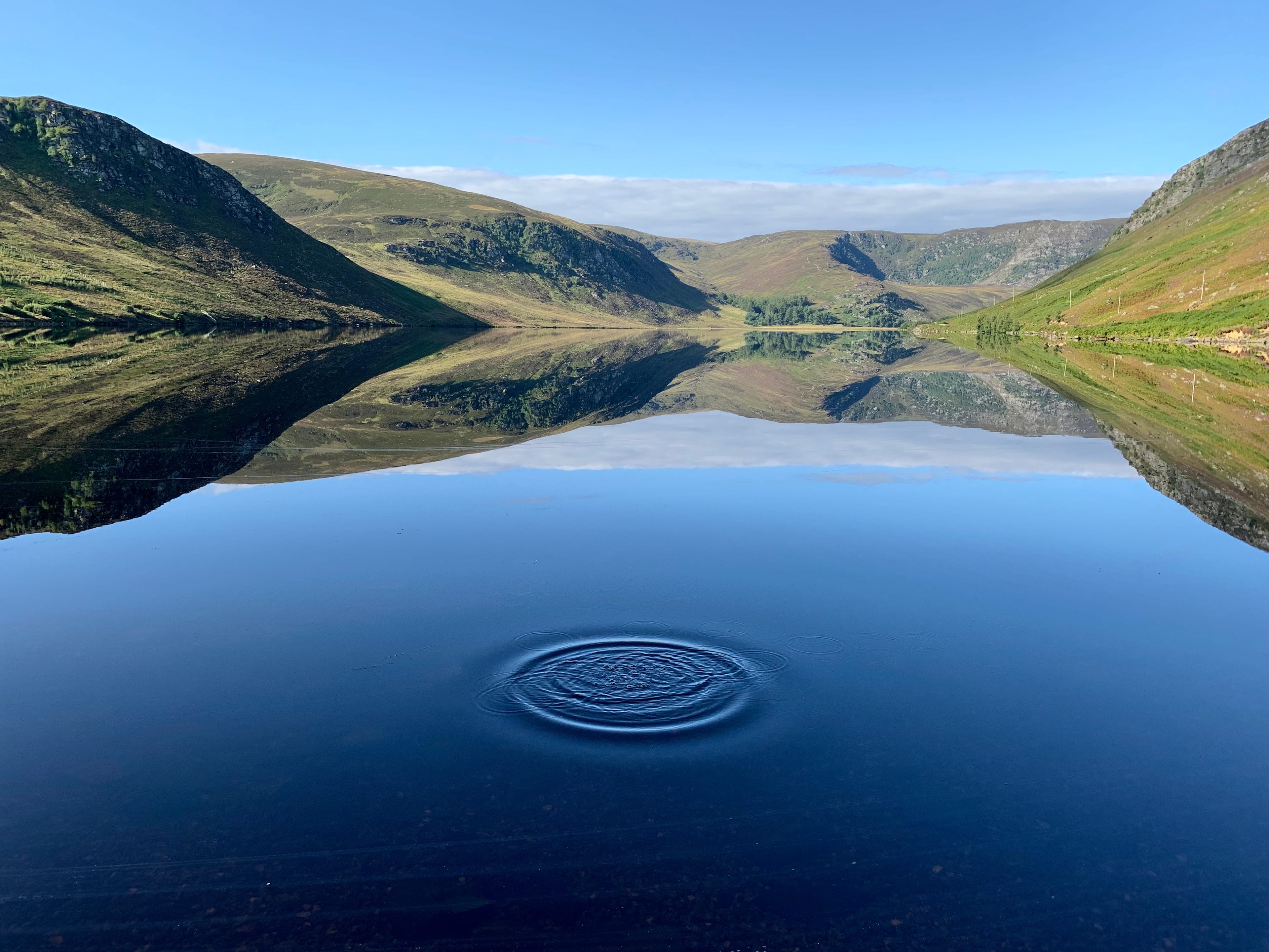 CAUSING A RIPPLE: Right time, right place as a well-placed stone creates a breach in the perfect waters of Loch Lee