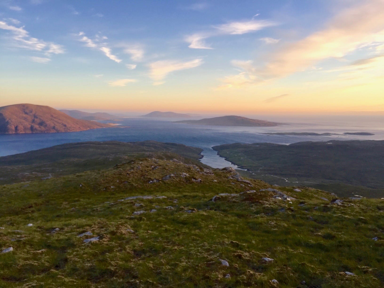 'GOLDEN GRAHAM: Sunset colours streak the sky during an ascent of Uisgneabhal Mor on Harris, one of number of island Grahams'