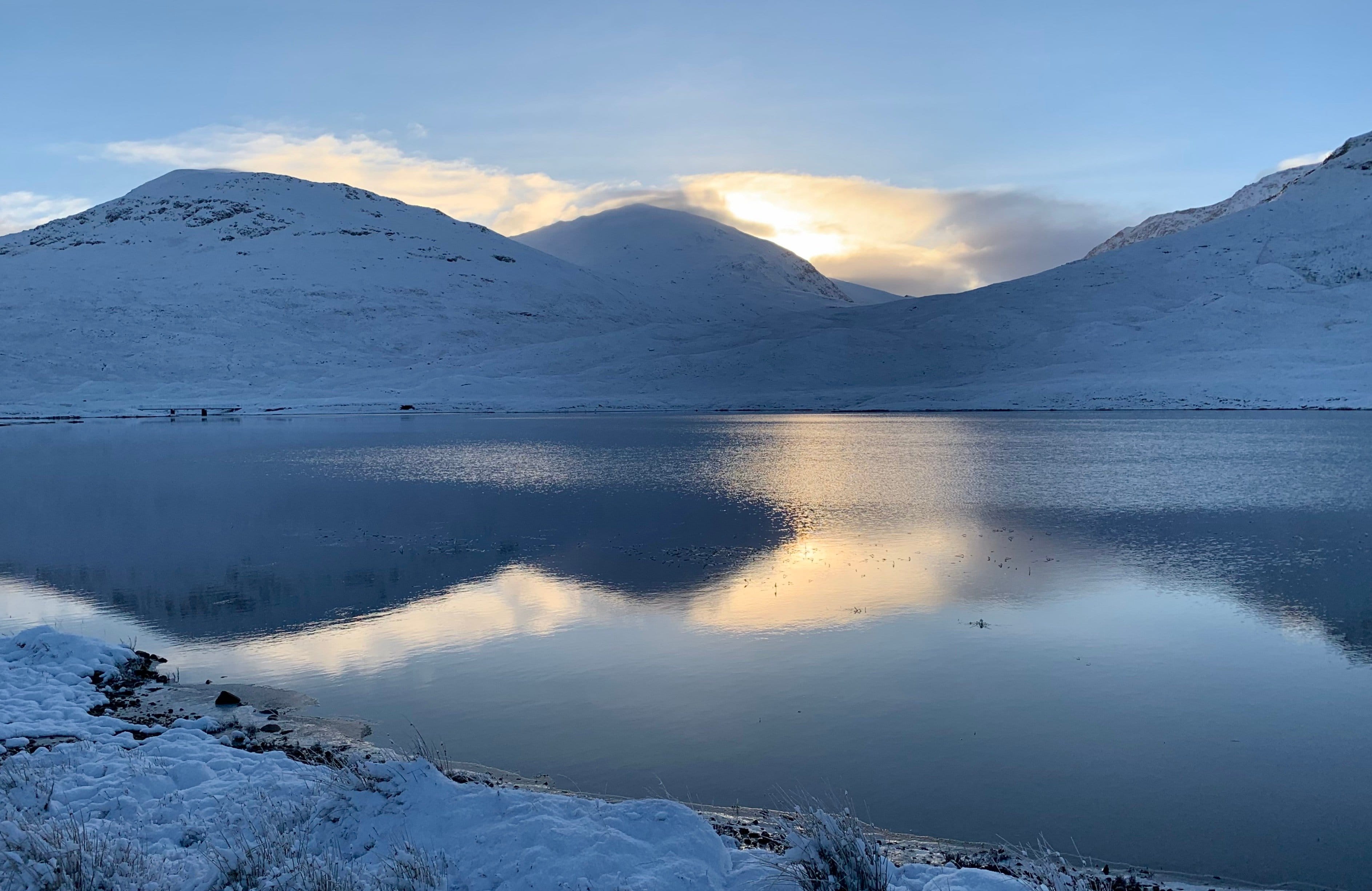 HOW IT STARTED: Brilliant morning light spilling over the hills and reflecting on the waters of Loch a'Bhraoin